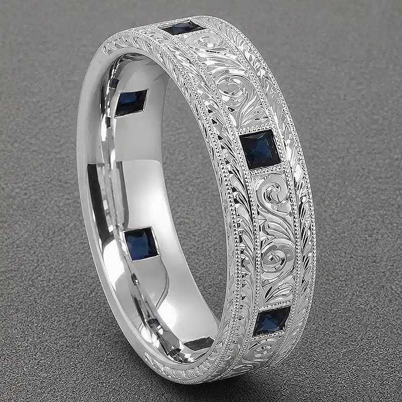 art deco mens wedding band with princess cut blue sapphires and hand engraving in white gold or platinum by orospot