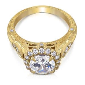 Vintage diamond halo engagement ring with hand engraving, milgrain edges, and pavé diamond accents in 14K gold or platinum