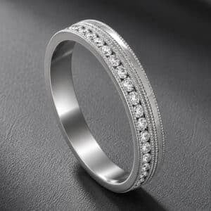Contemporary wedding band featuring channel-set diamonds, four rows of milgrain detail, and a sleek 3.5mm profile.