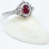 filigree oval ruby engagement ring