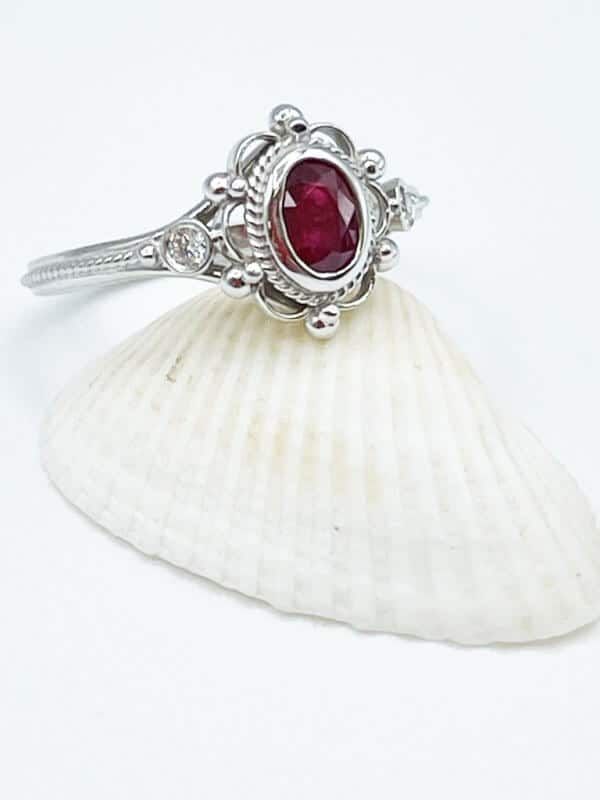 filigree oval ruby engagement ring