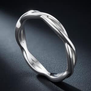 Modern braided wedding ring with an intertwined shank design representing unity and commitment.