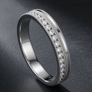 Elegant eternity wedding band with channel-set diamonds and four rows of milgrain detail in a modern 3.5mm design.