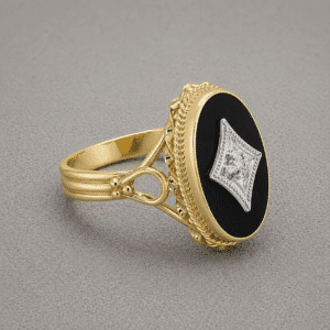 Victorian black onyx and diamond ring with oval onyx center and bezel set diamond in 14k yellow gold by OroSpot