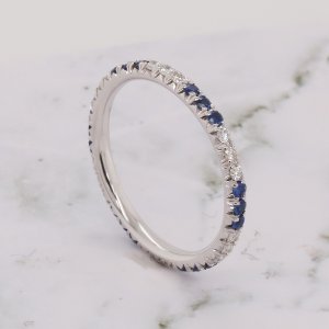 Contemporary sapphire and diamond wedding ring