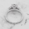 Hand engraved three stone ring