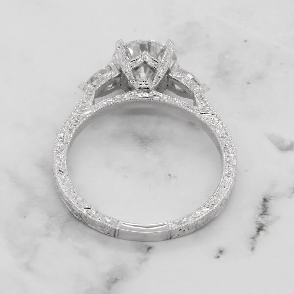 Hand engraved three stone ring