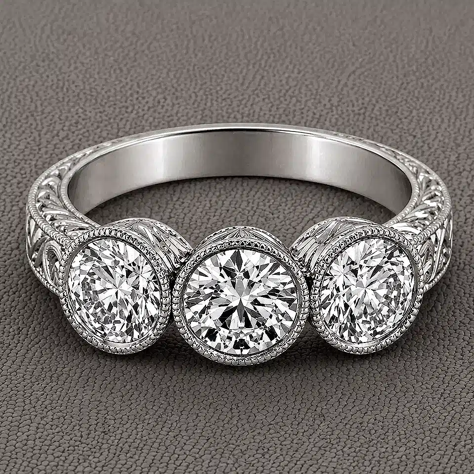 vintage 3 stone bezel diamond ring with lab diamonds low profile hand engraved scroll and wheat details OroSpot