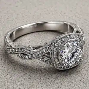 Vintage halo 1.5ct diamond engagement ring in platinum featuring a round center diamond surrounded by a diamond halo with pavé-set diamonds along the band.