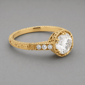 Vintage style yellow gold engagement ring with 1ct lab grown diamond center, hand engraved band, filigree crown, and micro pavé side diamonds by OroSpot