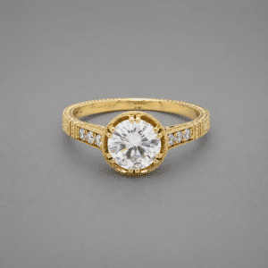 Side view of vintage yellow gold engagement ring with 1ct lab grown diamond, filigree crown, hand engraving, milgrain edges, and pavé diamonds