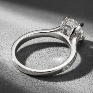 Contemporary engagement ring with round lab diamond and pavé platinum band by OroSpot.