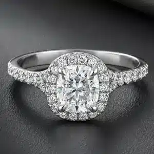 Elongated cushion lab-grown diamond engagement ring with diamond halo, pavé split shank, and flush-fit design in white gold.