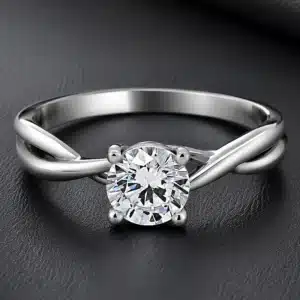 Infinity engagement ring with certified round lab-grown diamond and polished infinity-style shank in white gold.