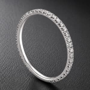 Minimalist diamond wedding band with French cut-down set natural diamonds, crafted in gold or platinum with a sleek 1.6mm profile.