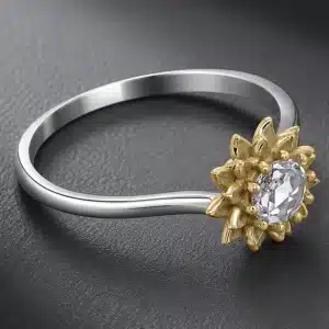 two-tone sunflower engagement ring with a rose cut natural diamond, 18k yellow gold petals, and platinum band