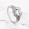 Hand engraved halo ring with 8.5mm Moissanite