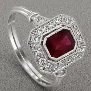 art deco emerald cut ruby engagement ring with diamond halo and pavé band in 18k gold orospot