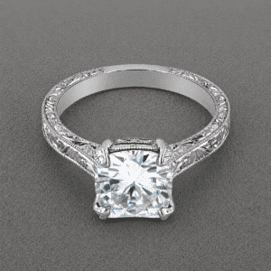 art deco cushion ring mounting with scroll engraving and polished finish