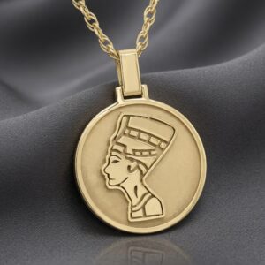 Gold Nefertiti disc pendant inspired by ancient Egyptian queen symbolism by OroSpot.