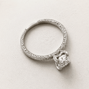 antique radiant cut solitaire engagement ring with hand engraved shank and milgrain edges in white gold orospot