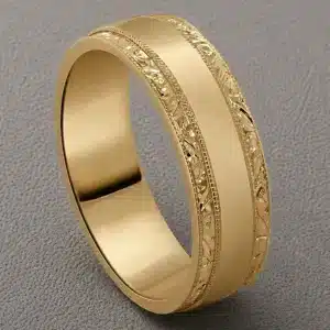 art deco mens wedding band with matte center polished edges and engraved side stripes