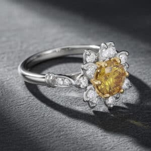 Floral engagement ring with round yellow lab diamond and diamond halo in platinum by OroSpot.