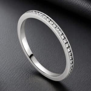 Ultra-thin 1.4mm diamond eternity band in 14K white gold featuring channel-set round diamonds and a high-polish finish.