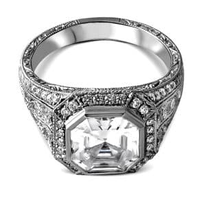 3ct Asscher diamond ring with hand engraving, filigree details, and diamond halo in vintage Art Deco style.