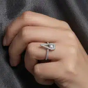 Vintage-inspired brown diamond engagement ring with a bezel-set center stone, diamond halo, and diamond-accented band.