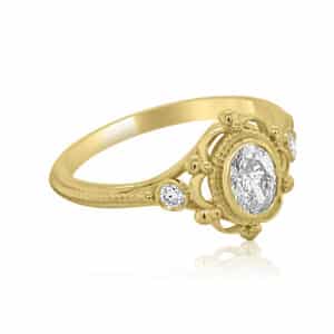 Oval diamond bezel engagement ring OroSpot