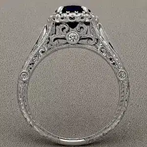 art deco sapphire engagement ring 1.5ct round blue sapphire with diamond halo and engraved band orospot