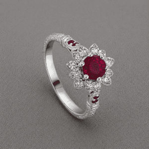 Vintage ruby flower diamond ring with natural ruby center, floral diamond halo, and pavé ruby shoulders in art nouveau style by OroSpot
