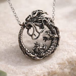 Ouroboros circle dragon pendant representing infinity, renewal and balance in a clean detailed design