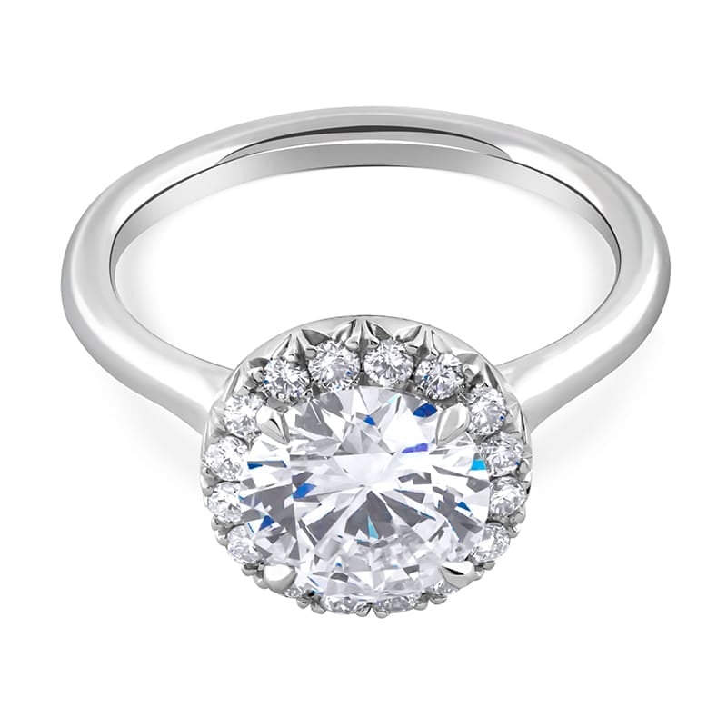 Contemporary 2-carat round diamond halo engagement ring in white gold with natural G-VS diamonds.