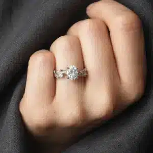 Organic tree branch solitaire ring crafted in solid 14K white gold with round lab diamond and realistic bark texture.
