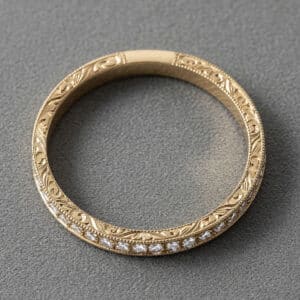 vintage diamond wedding band pave set diamonds milgrain edges engraved sides 14k gold orospot