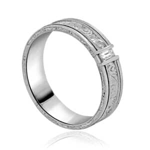 Art Deco men’s wedding ring with baguette diamond, hand-engraved detailing, and milgrain edges in platinum.