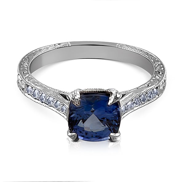 Lab-grown cushion-cut sapphire and diamond halo engagement ring in vintage Art Deco style, handcrafted by OroSpot in 14K gold with milgrain detailing