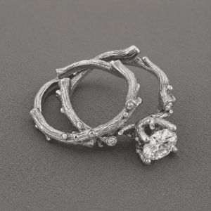 nature inspired twig engagement ring set with round diamond and matching branch wedding band orospot