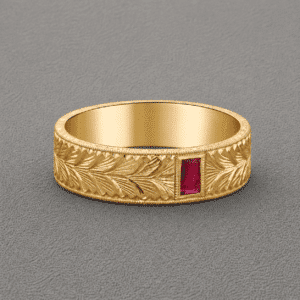 vintage men’s gold ring with ruby center and engraved milgrain band
