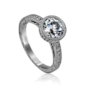 rose gold art deco bezel diamond engagement ring featuring a 6.5mm certified lab diamond with high polish and milgrain details
