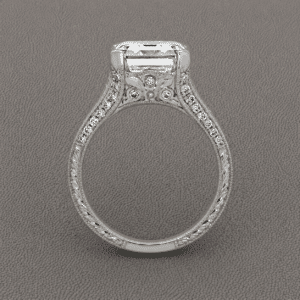 vintage asscher diamond ring with trillion side diamonds pavé shoulders filigree and engraving OroSpot