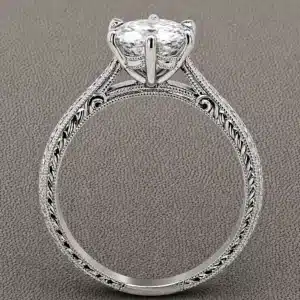 hand engraved art deco diamond engagement ring with 1.5ct round lab diamond six prong setting filigree and milgrain OroSpot
