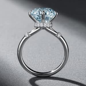 Aquamarine diamond engagement ring with 3.5ct center stone, hidden halo, and white gold setting by OroSpot.