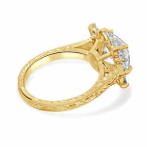 old world art deco cluster ring with lab grown diamond halo and hand engraved decorative carving