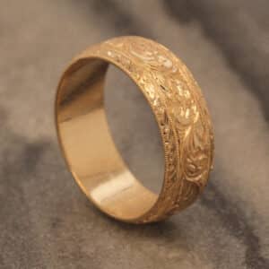 8mm gold mens wedding band with deep hand engraved floral scroll pattern and wheat engraving sides orospot