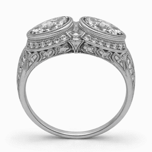 vintage pear diamond engagement ring platinum with milgrain and pavé diamonds