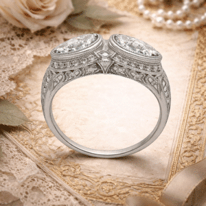 vintage double pear diamond ring with halo diamonds milgrain bezel and hand engraved platinum band