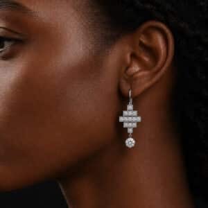 Vintage inspired geometric white gold earrings with pavé lab diamonds and round 5mm dangling center stones.